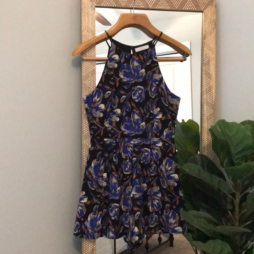 Black romper with floral design